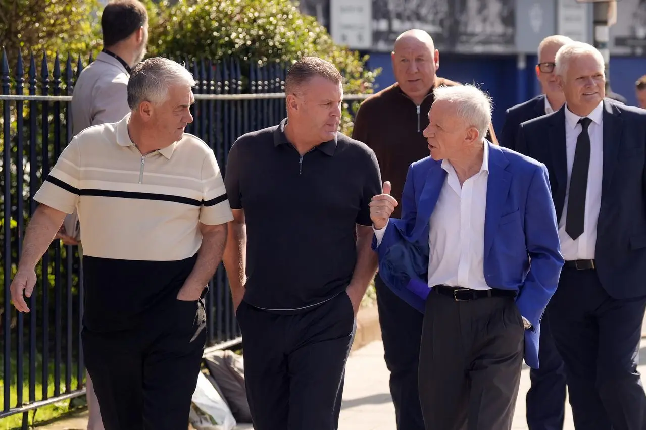 Ian Snodin, Graham Stuart and Peter Reid arrive at the St Luke's Church ahead of Kevin Campbell's memorial service