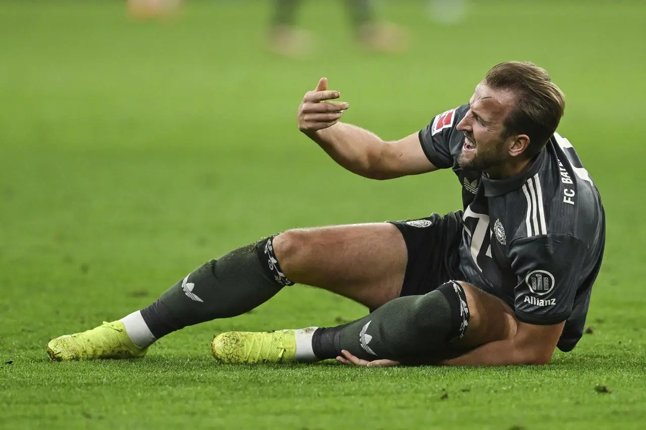 Harry Kane goes down during Bayern Munich's draw with Bayer Leverkusen