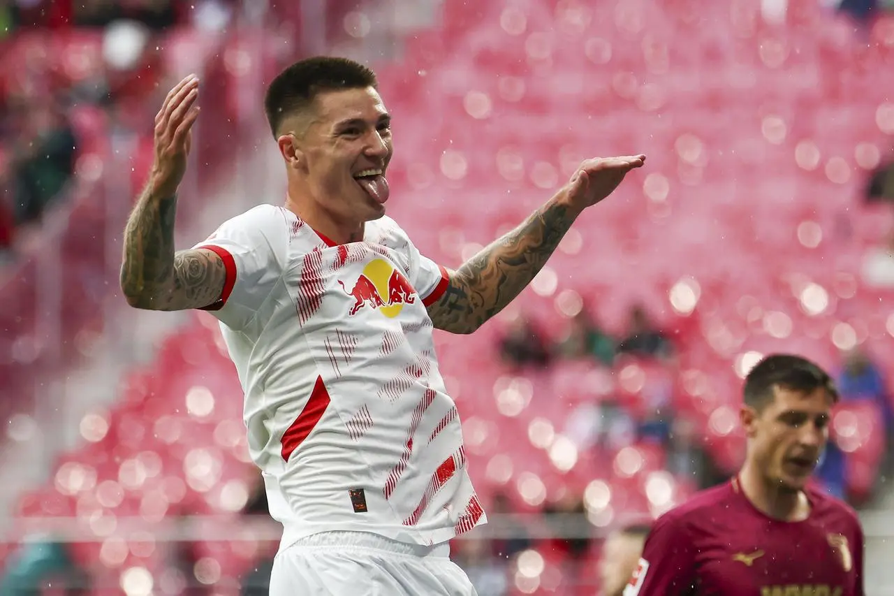 Benjamin Sesko celebrates scoring for RB Leipzig