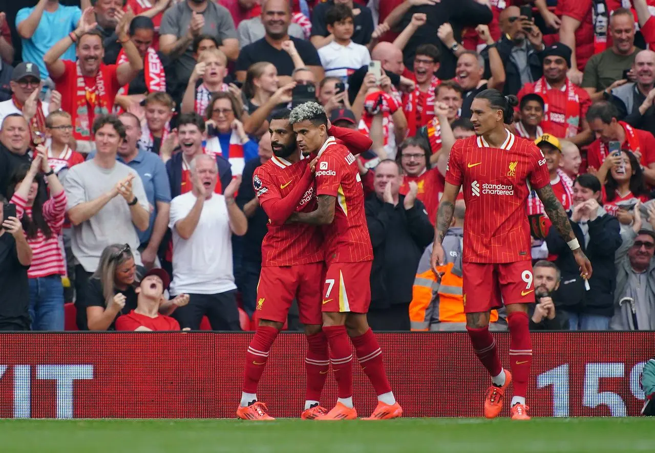 Luis Diaz, centre, celebrates his second goal against Bournemouth with Mohamed Salah, left, and Darwin Nunez