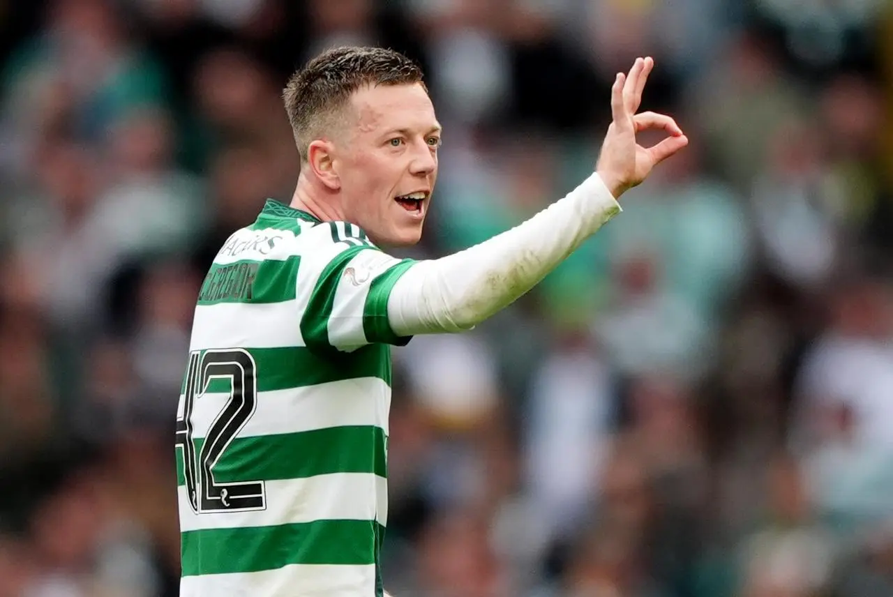 Celtic captain Callum McGregor raises three fingers after putting Celtic 3-0 up against Rangers