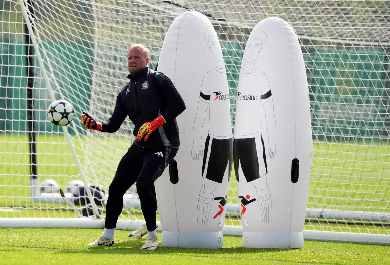 Kasper Schmeichel trains in front of equipment