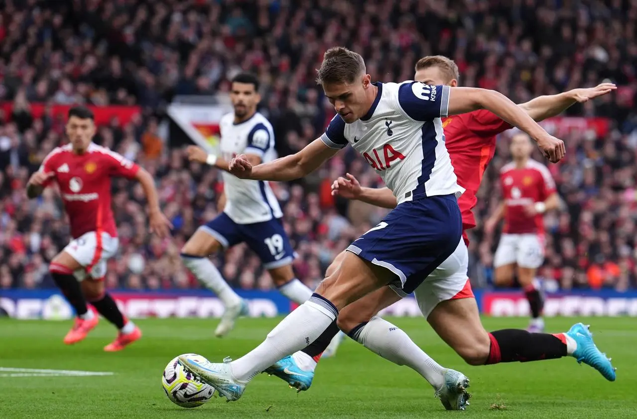 Micky van de Ven crosses left foot to set up Tottenham's opening goal 