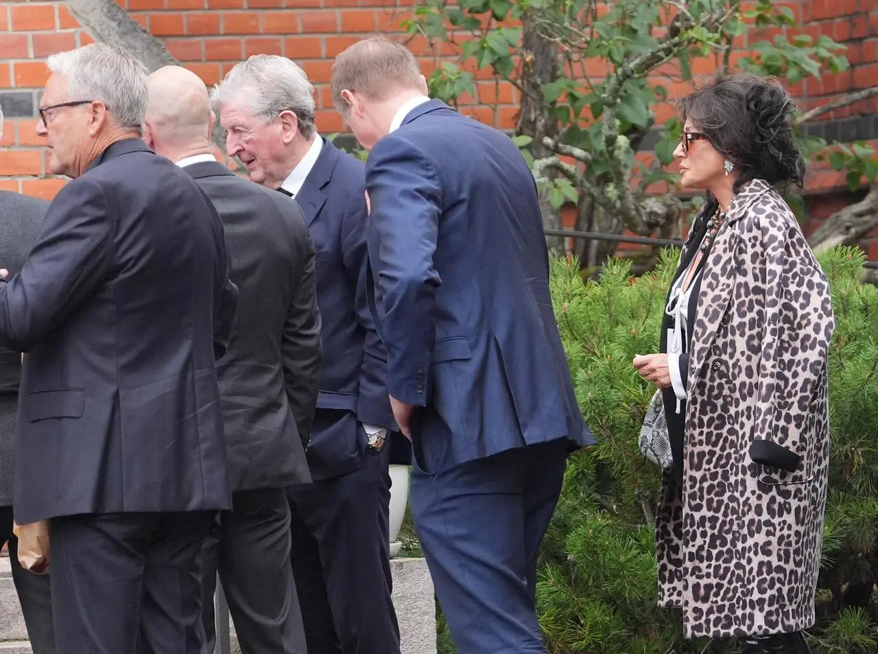 Roy Hodgson, third left, and Nancy Dell’Olio, right, among the mourners arriving for the funeral of Sven-Goran Eriksson