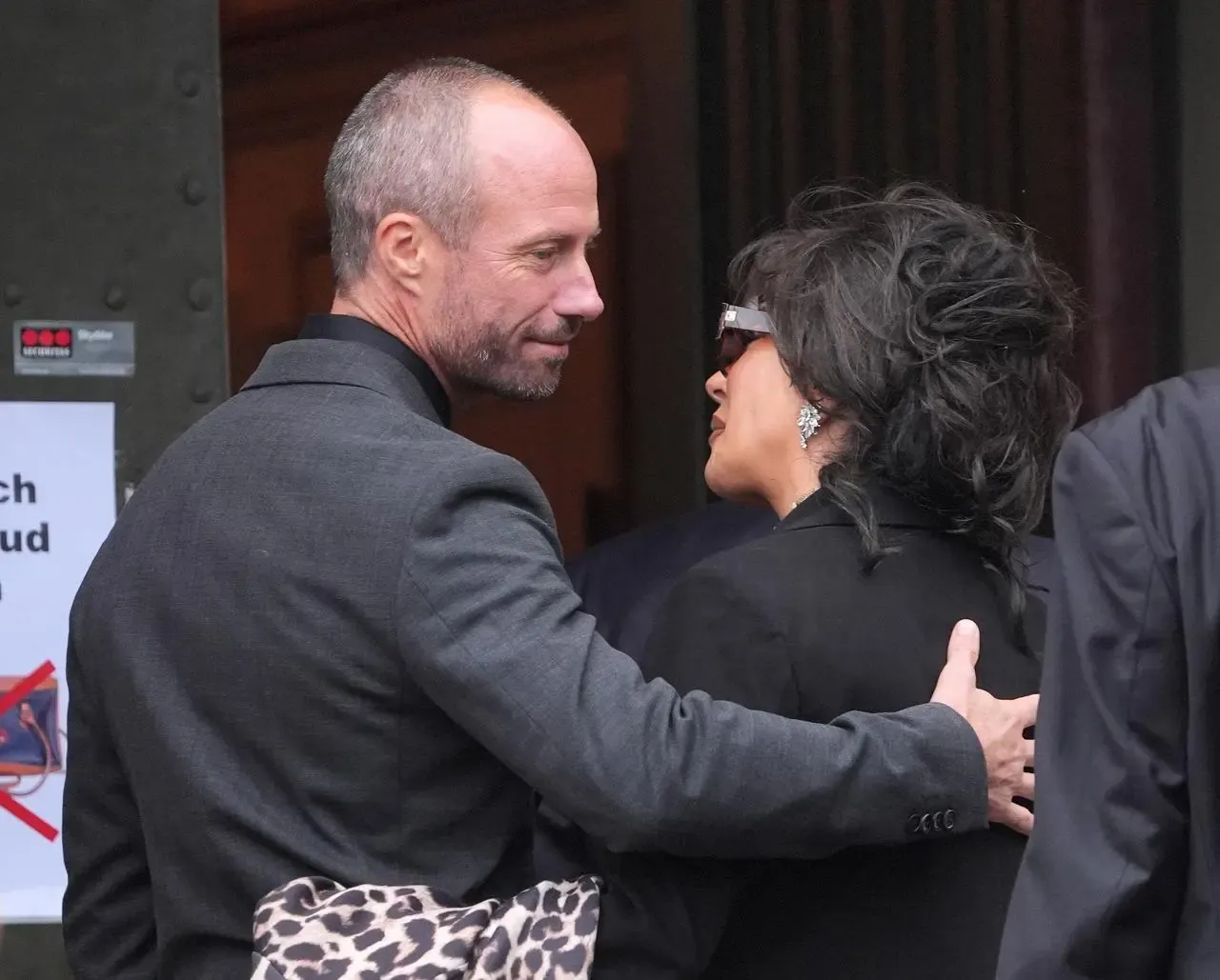 Sven-Goran Eriksson’s former partner Nancy Dell’Olio, right, is greeted by Eriksson’s son Johan at the funeral service