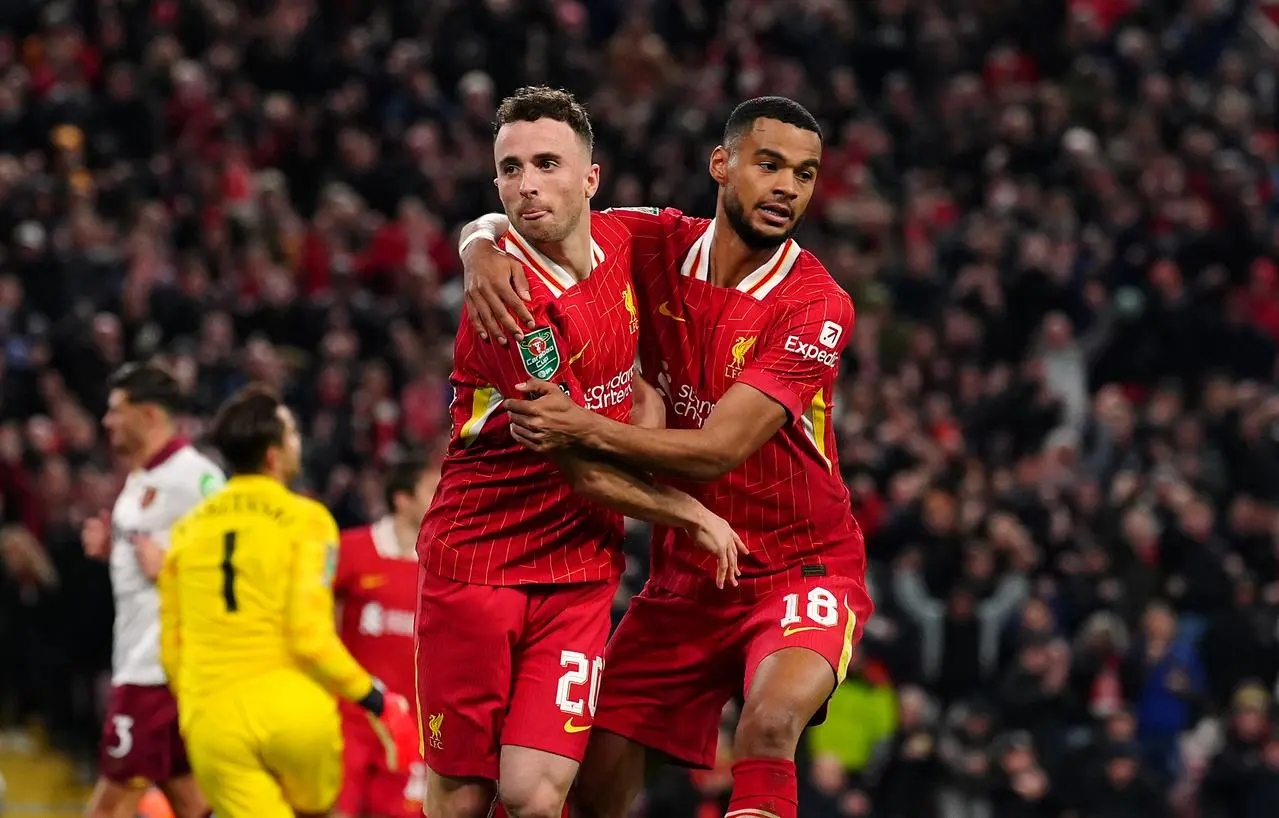 Liverpool's Diogo Jota and Cody Gakpo celebrate scoring together