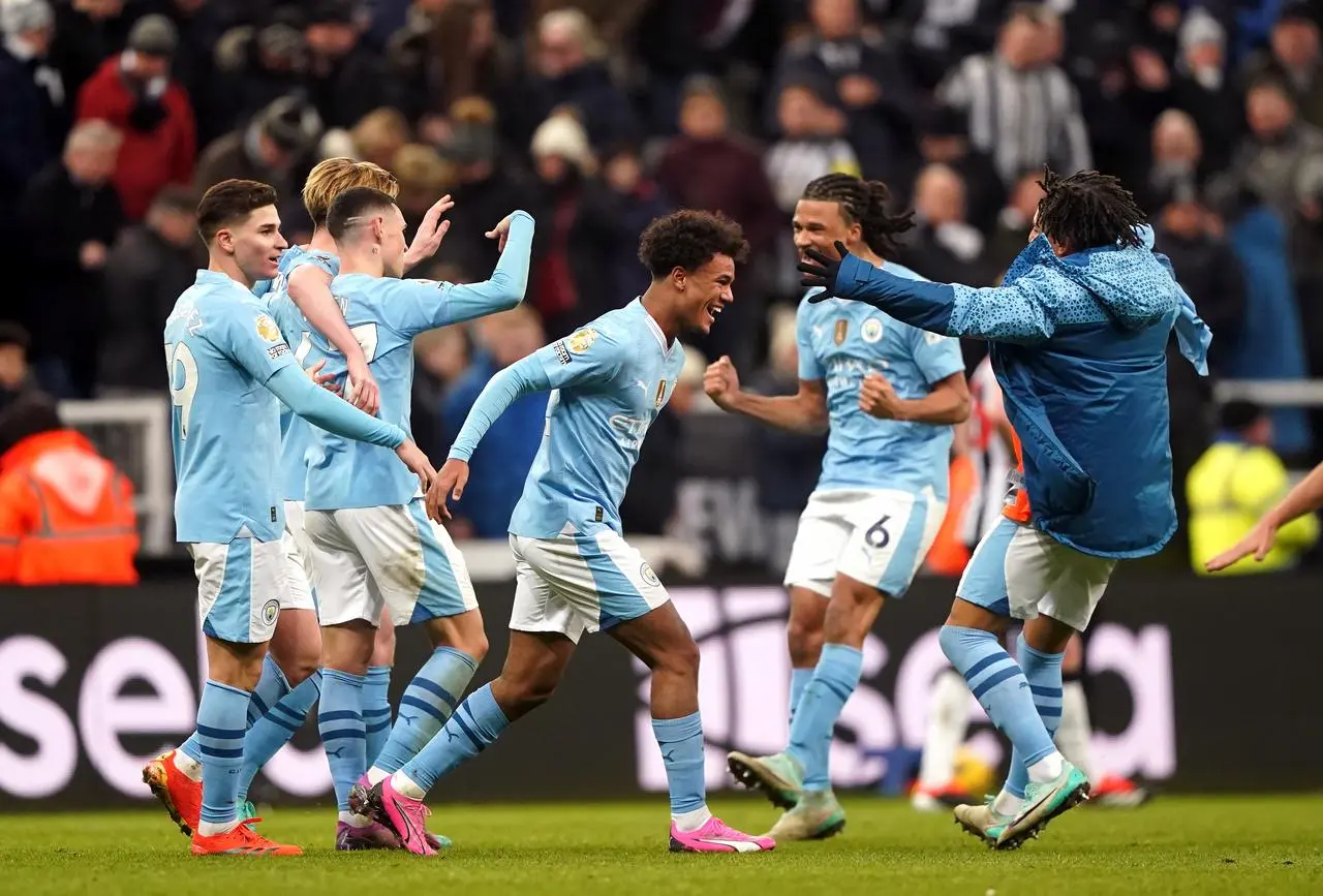 Manchester City’s Oscar Bobb celebrates scoring a late winner a Newcastle