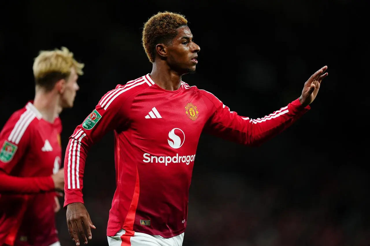 Marcus Rashford celebrates after opening the scoring against Barnsley