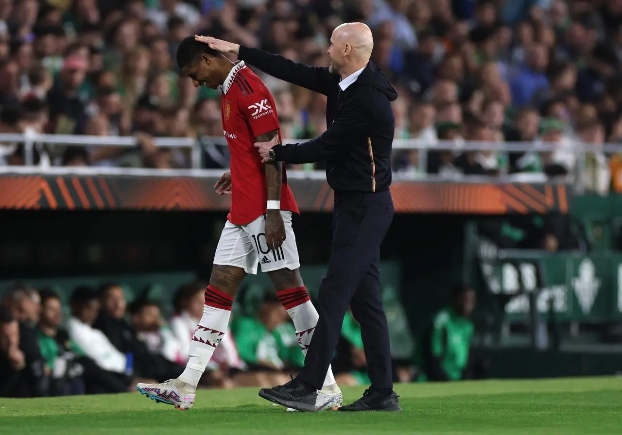 Marcus Rashford, left, is congratulated by manager Erik ten Hag after being substituted in a Europa League match