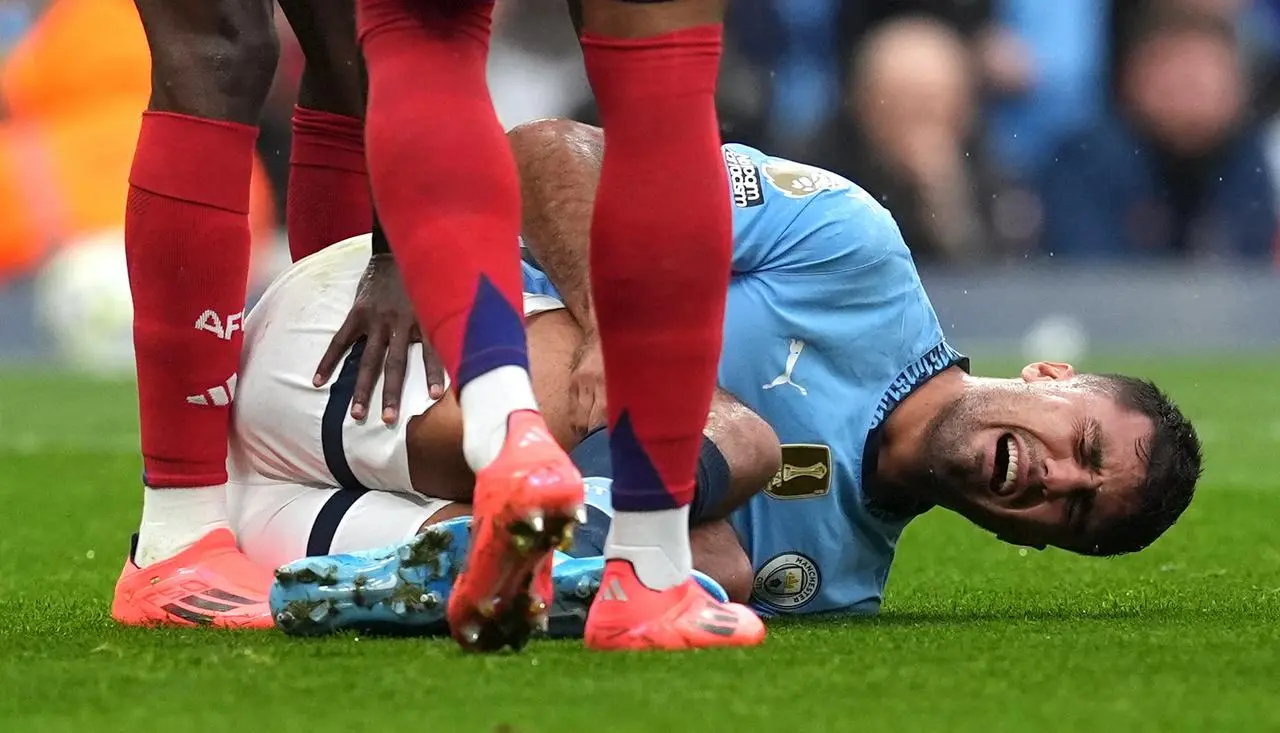 Rodri lies on the floor in agony after damaging knee ligaments