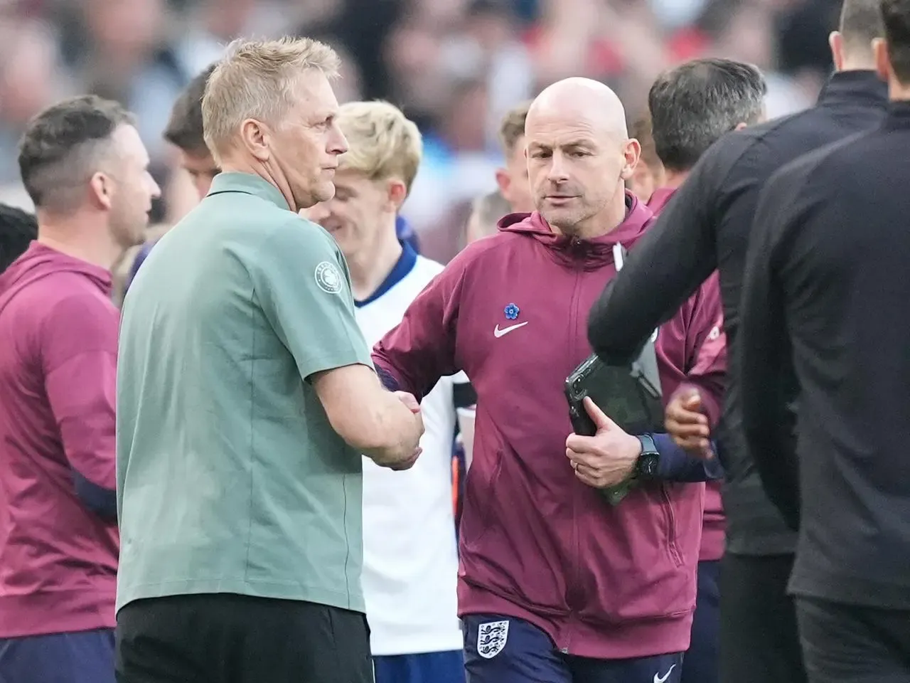 Lee Carsley shakes hands with Republic of Ireland manager Heimir Hallgrimsson after England's win