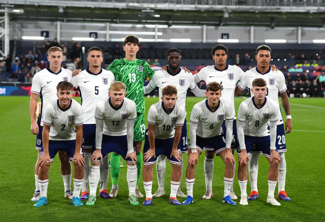 The England team line up before the Under-21 international friendly against Austria at Kenilworth Road