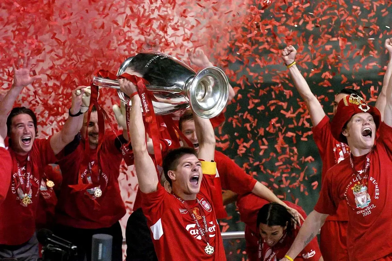 Liverpool captain Steven Gerrard lifts the 2004-5 UEFA Champions League trophy after victory over AC Milan