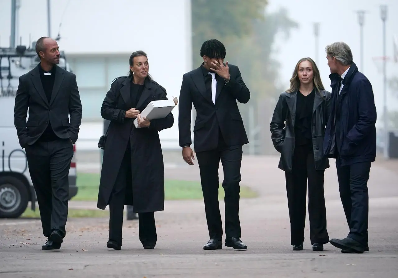 Sven-Goran Eriksson’s children Johan, left, and Lina, second left, among the mourners arriving for the former England manager's funeral