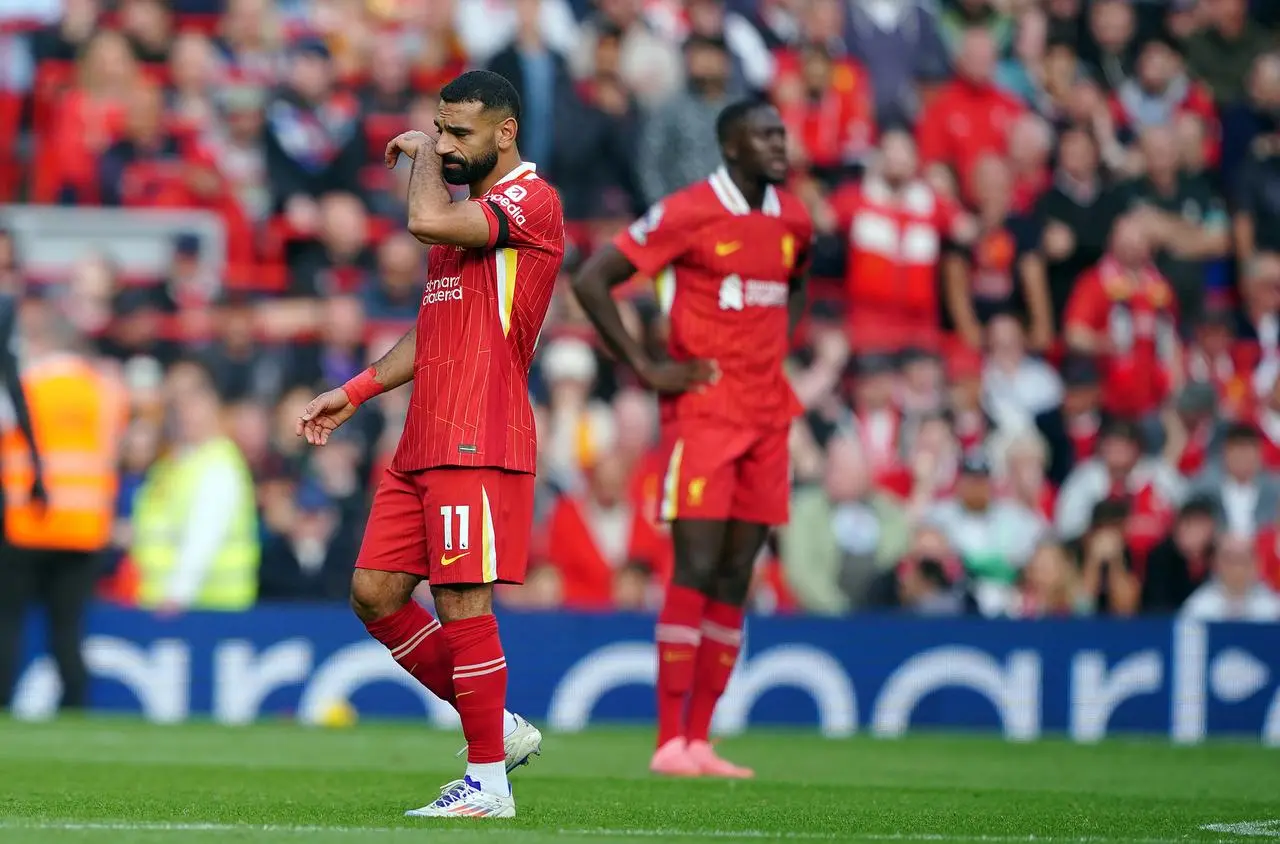 Liverpool’s Mohamed Salah stands dejected 