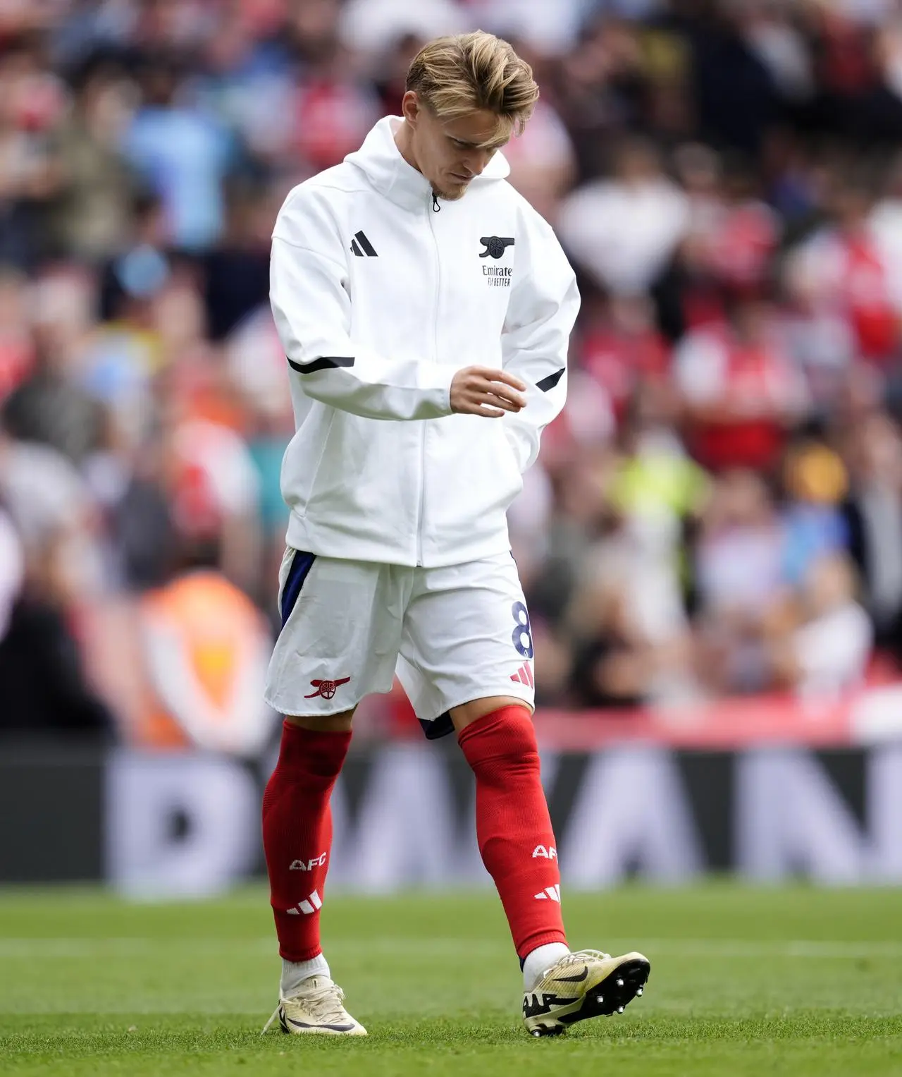 Arsenal's Martin Odegaard shows his dejection after the Premier League match against Brighton