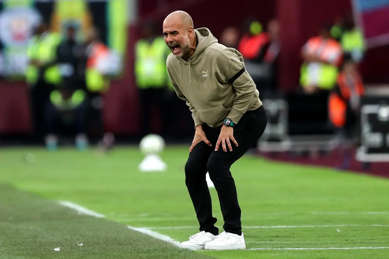 Pep Guardiola on the touchline