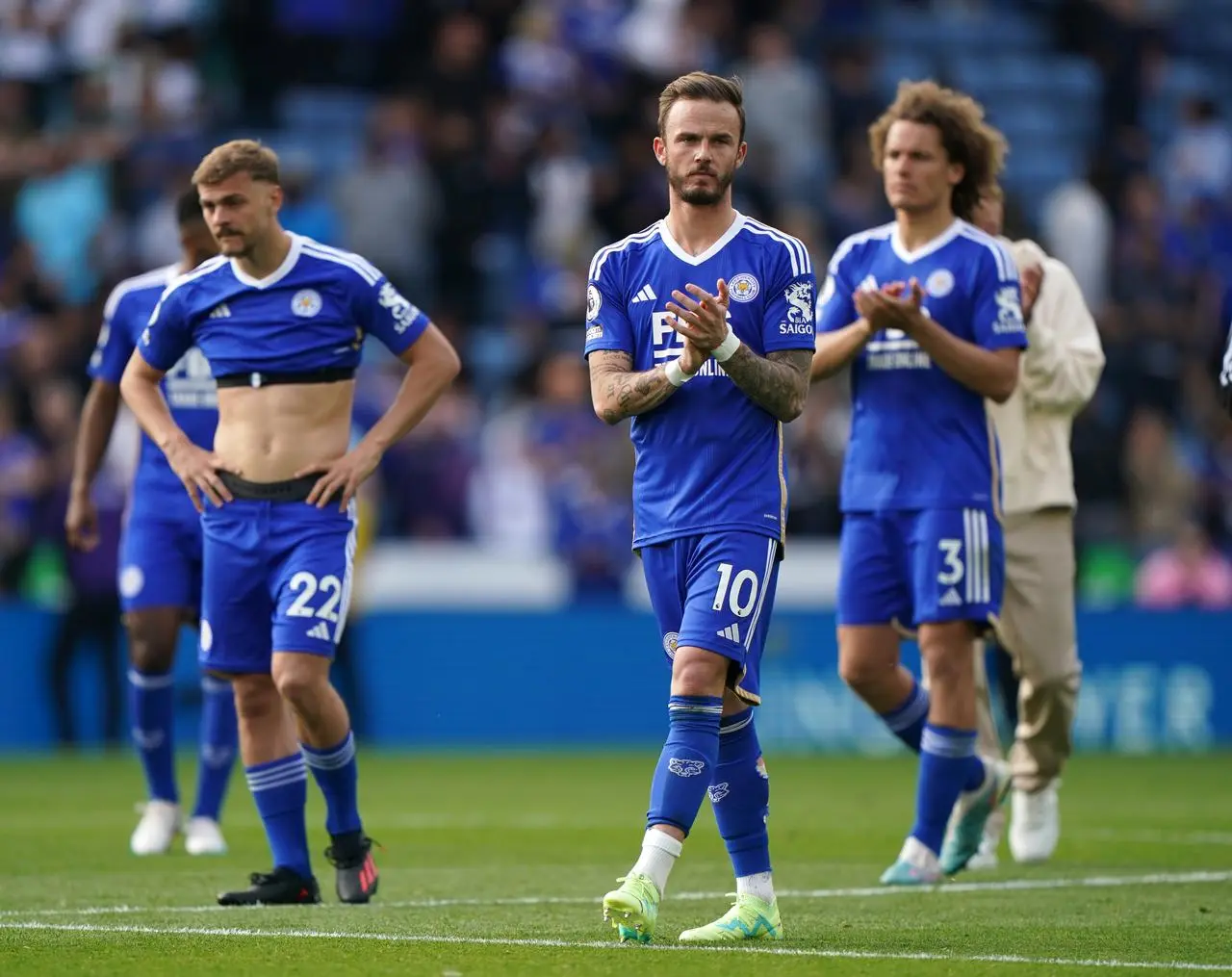 Leicester  players look dejected after their relegation