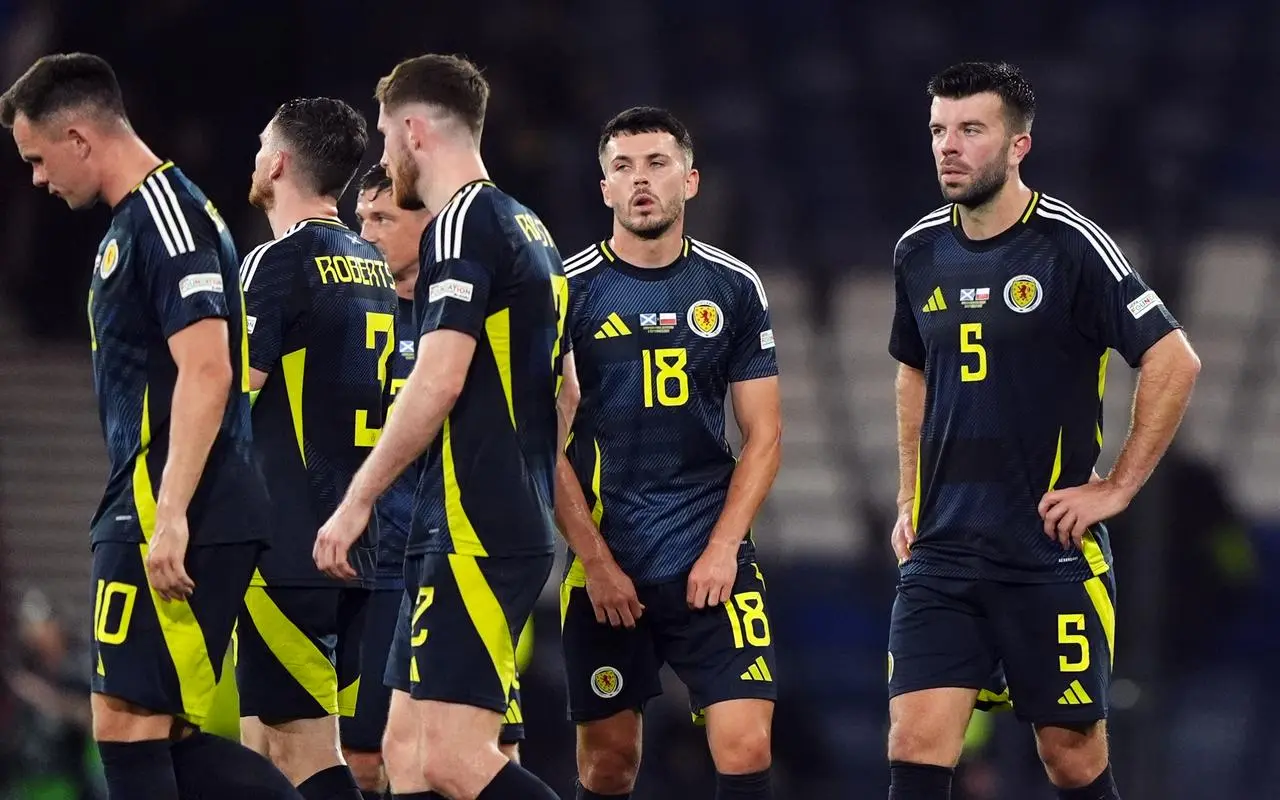 Scotland players react after the late defeat