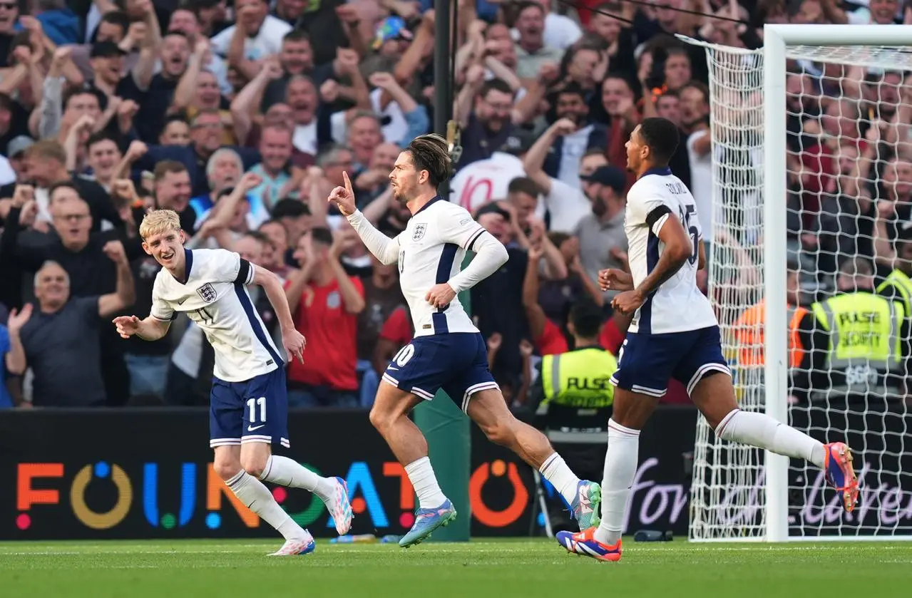 Jack Grealish celebrates scoring for England