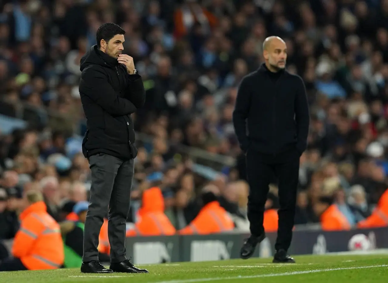 Mikel Arteta, left, and Pep Guardiola on the touchline during the 2022-23 season