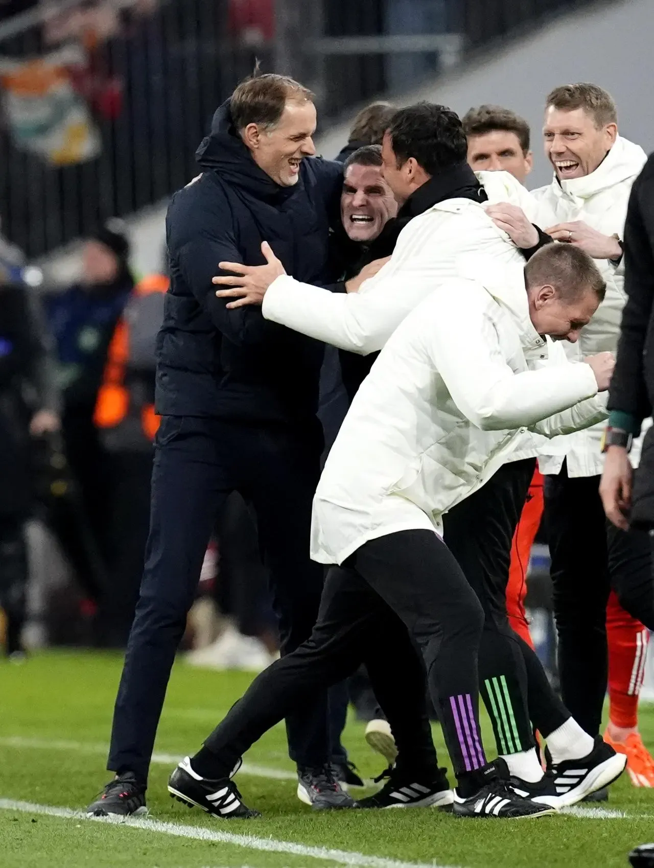 Thomas Tuchel celebrates a victory with his Bayern Munich coaching staff including Anthony Barry