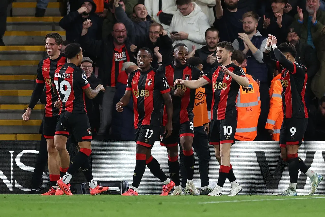 Bournemouth celebrate their opening goal against Arsenal