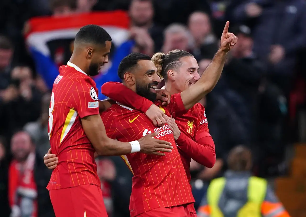 Mohamed Salah celebrates his goal with teammates