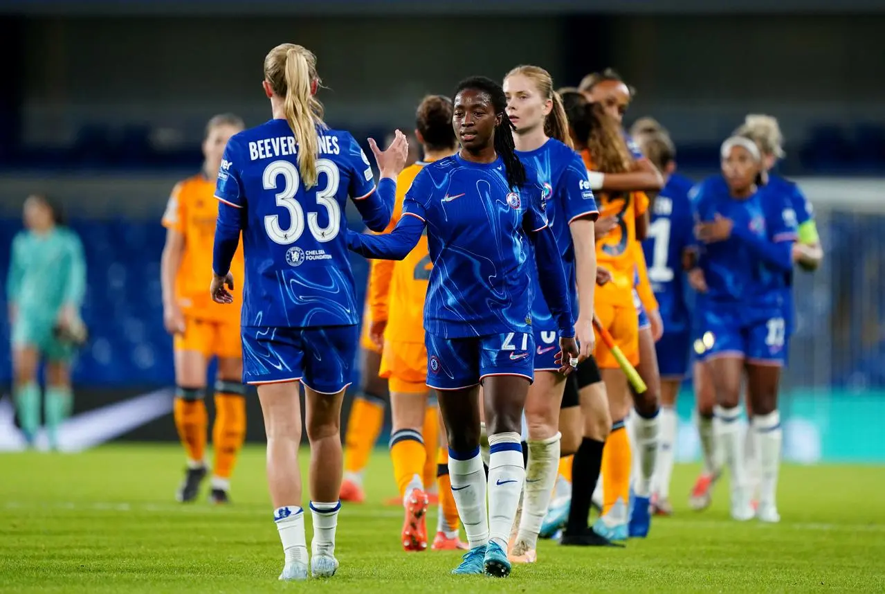 Chelsea’s Aggie Beever-Jones (left) and Oriane Jean-Francois (centre) celebrate at the final whistle