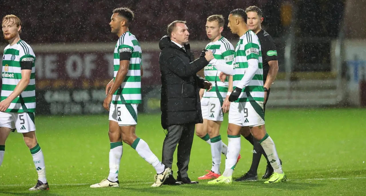 Celtic manager Brendan Rodgers with Adam Idah following the game