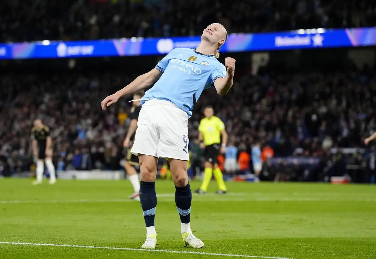 Erling Haaland clenches his fist to celebrate another goal for City