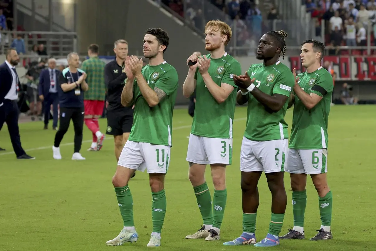 Republic of Ireland players applaud the fans at the end of the Nations League defeat in Athens