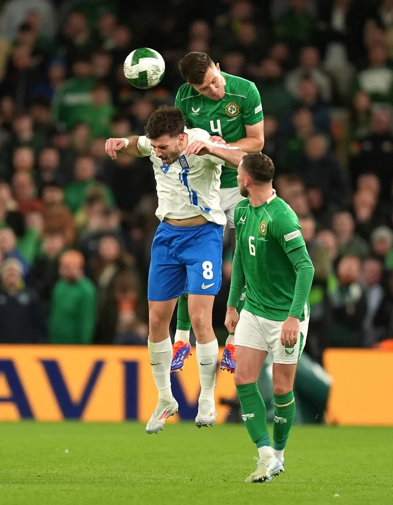 Republic of Ireland’s Dara O’Shea (top) heads the ball clear during a Nations League fixture against Greece in Dublin