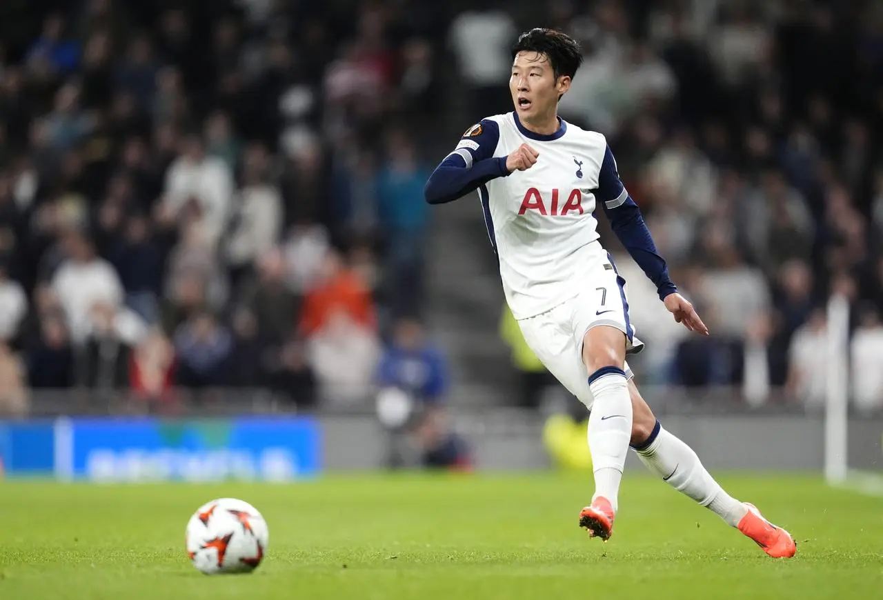 Son Heung-min passes the ball with his left foot during Tottenham game with Qarabag