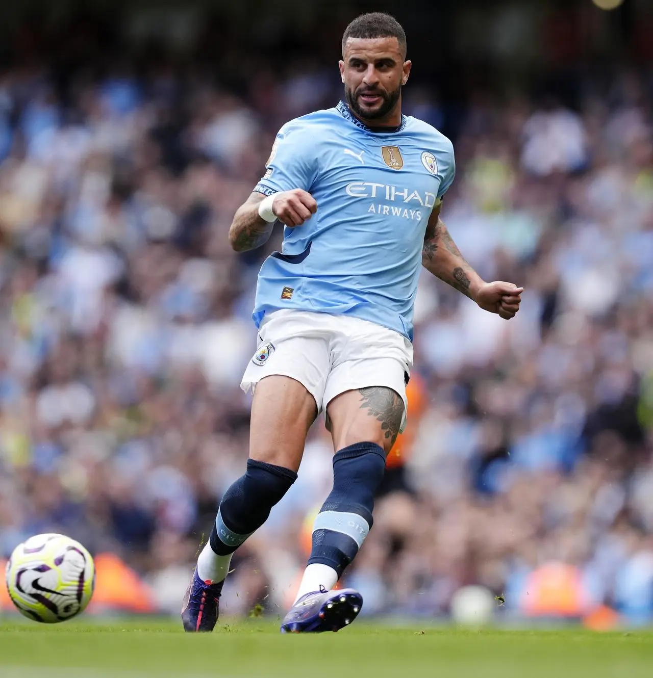 Kyle Walker passes the ball during a Manchester City game