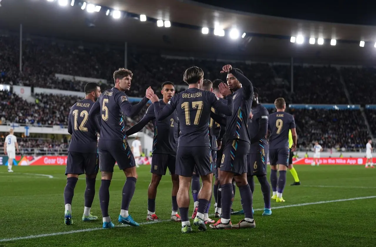 England players celebrate Jack Grealish's goal