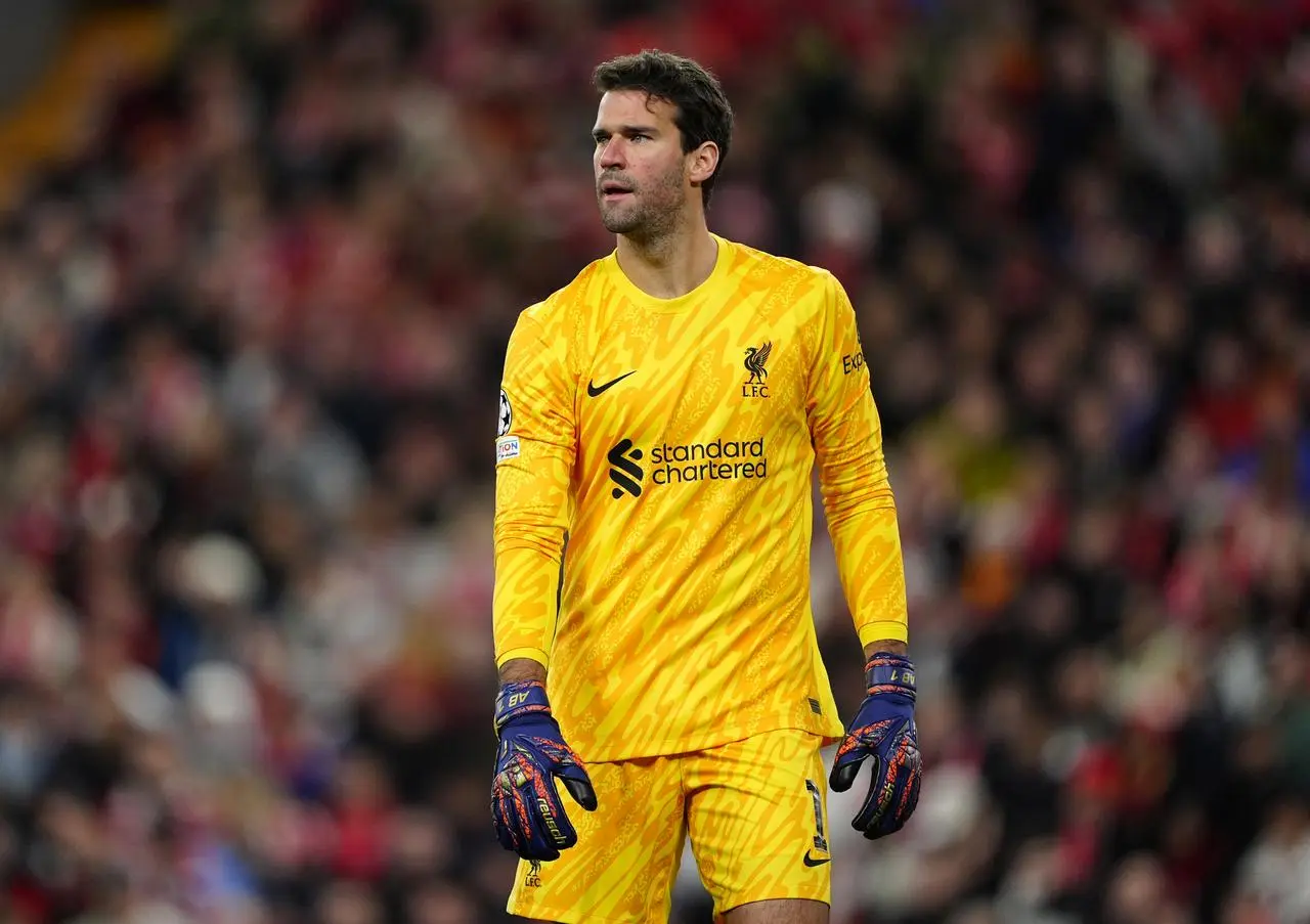 Liverpool goalkeeper Alisson Becker wearing yellow kit