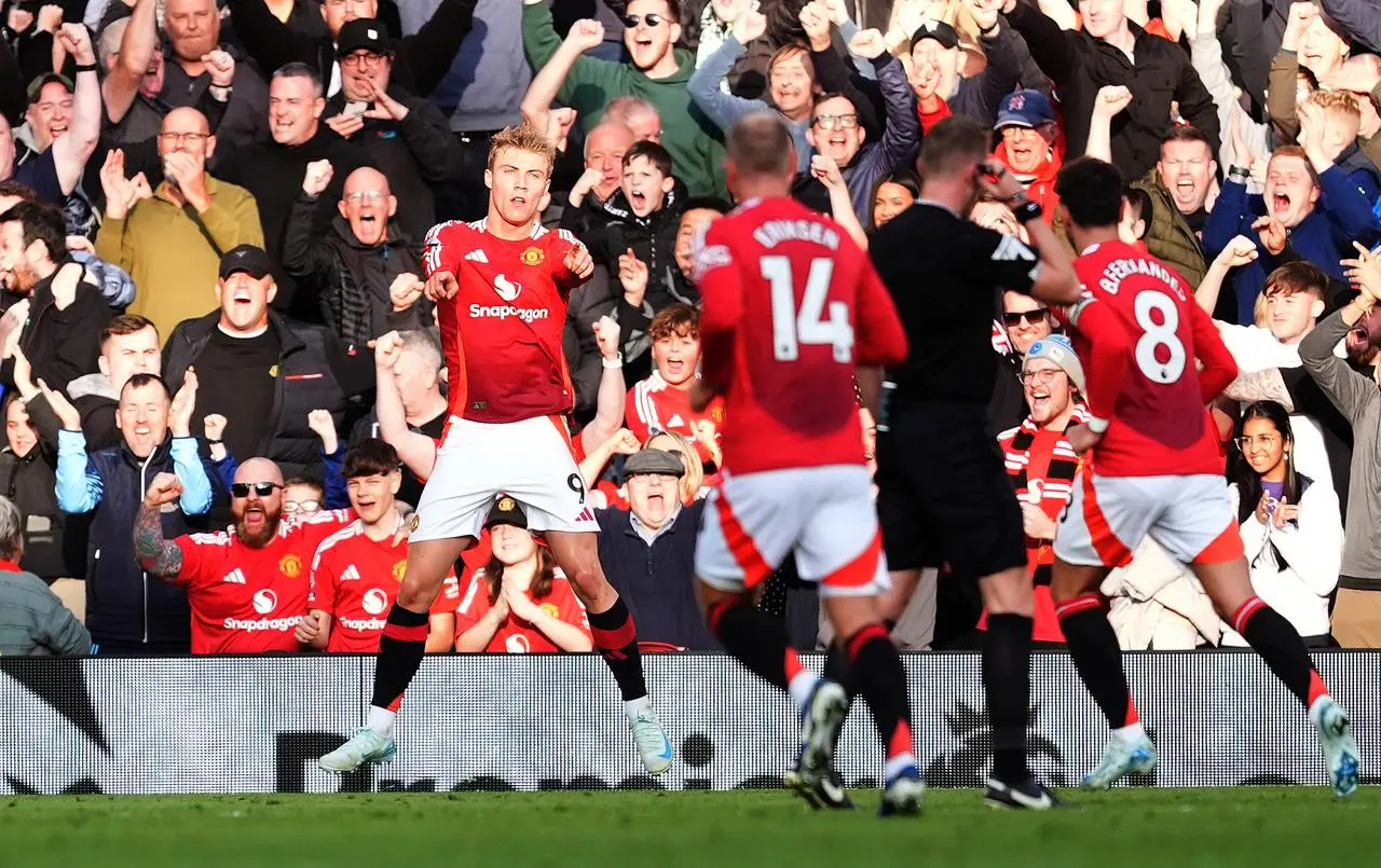 Rasmus Hojlund celebrates scoring with team-mates