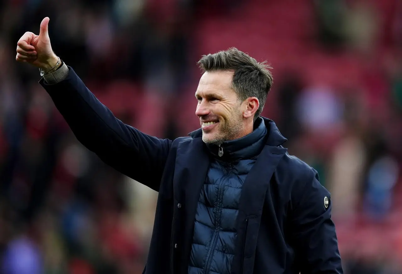 Manchester City manager Gareth Taylor celebrates after the Women’s Super League victory at Liverpool