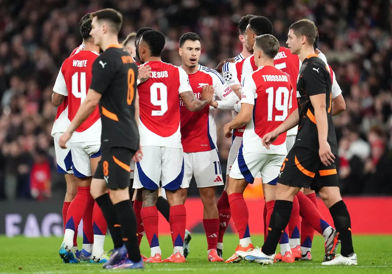 Arsenal players celebrate at the Emirates 