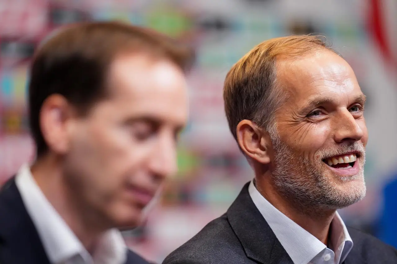 Newly appointed England head coach Thomas Tuchel, right, at a press conference