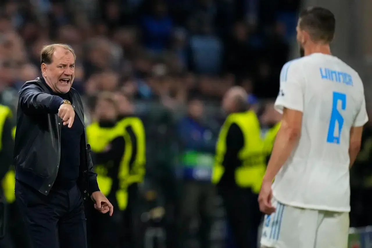 Vladimir Weiss Sr, left, issues instructions to Kevin Wimmer