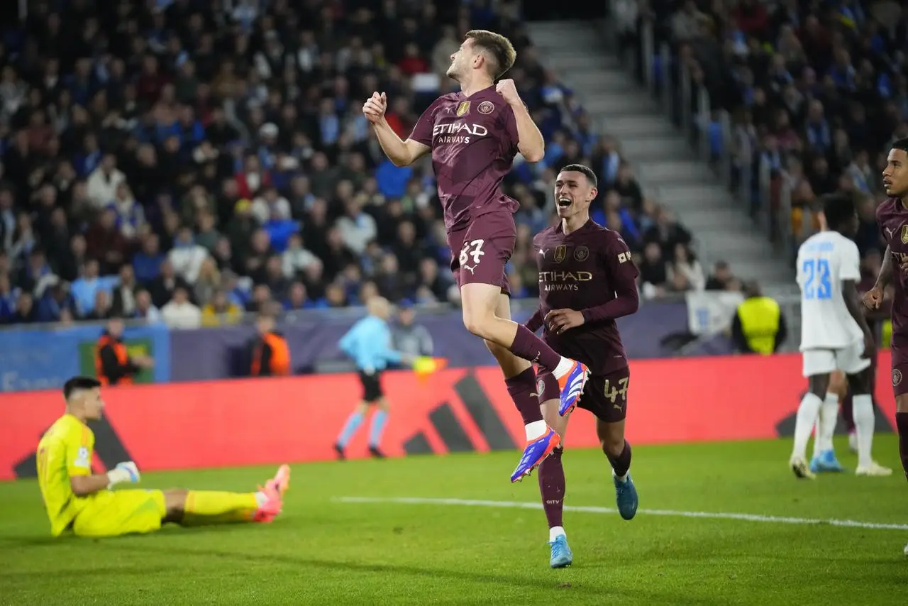 James McAtee leaps to celebrate his goal