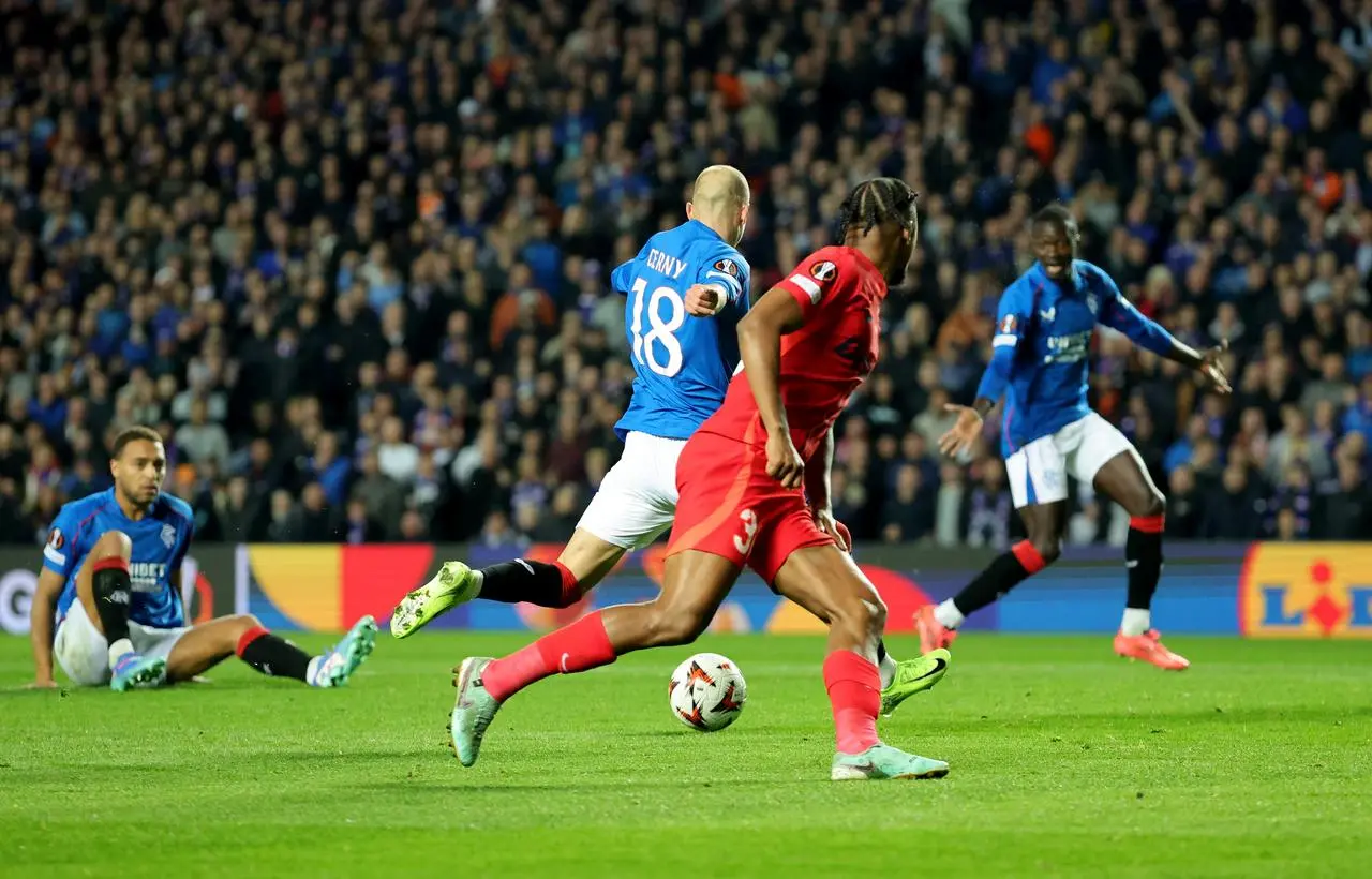 Vaclav Cerny, centre, scores Rangers' third goal against FCSB