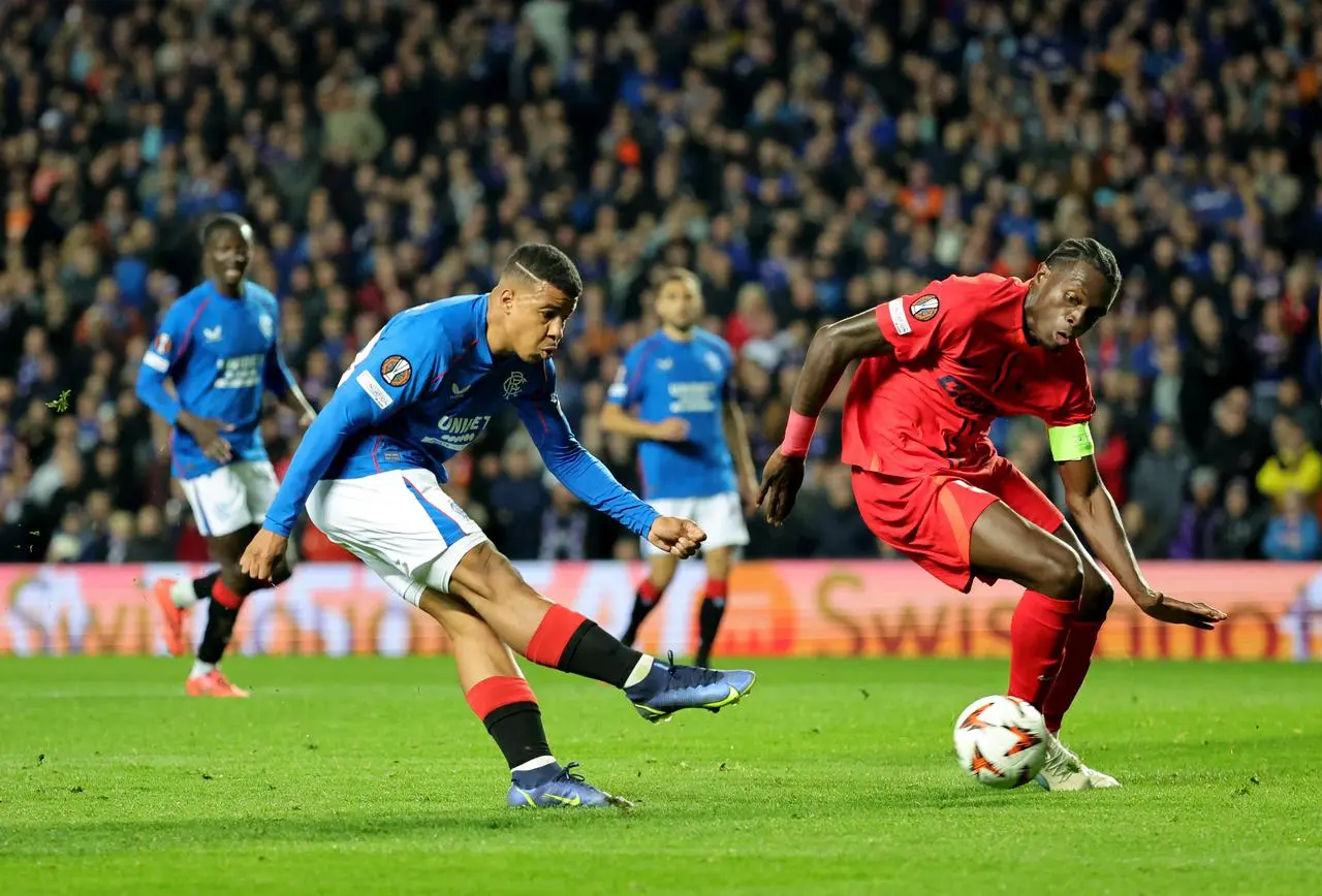 Hamza Igamane, left, scores Rangers' fourth goal against FCSB