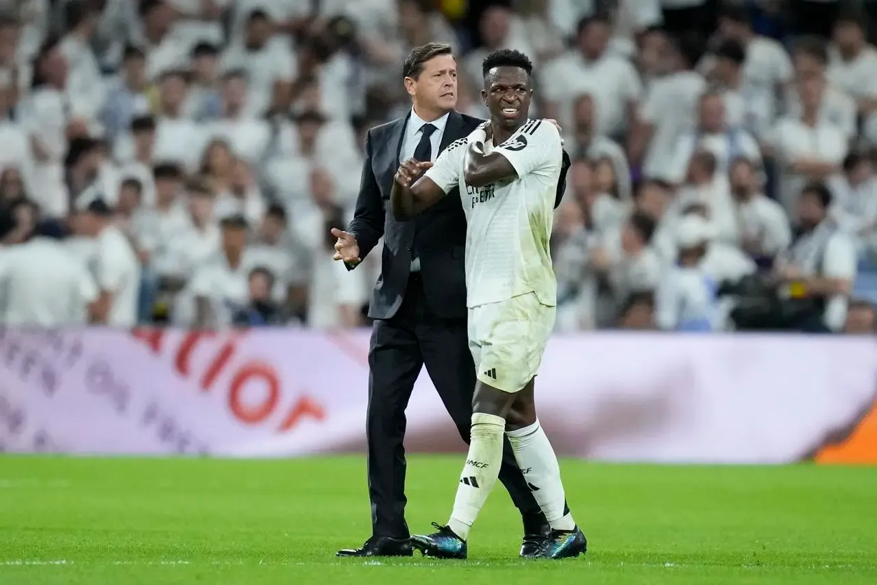 Real Madrid’s Vinicius Junior leaves the pitch injured during the match against Villareal (Bernat Armangue/AP)