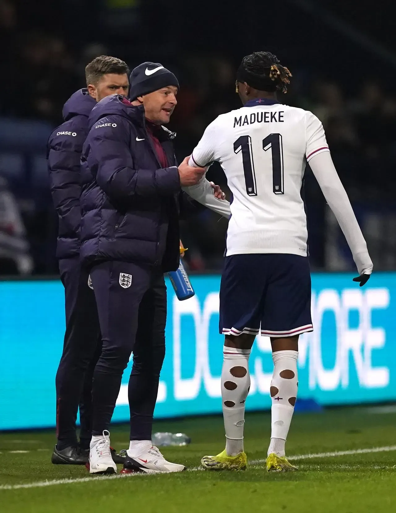 Noni Madueke, right, is congratulated by Lee Carsley after scoring for England Under-21s