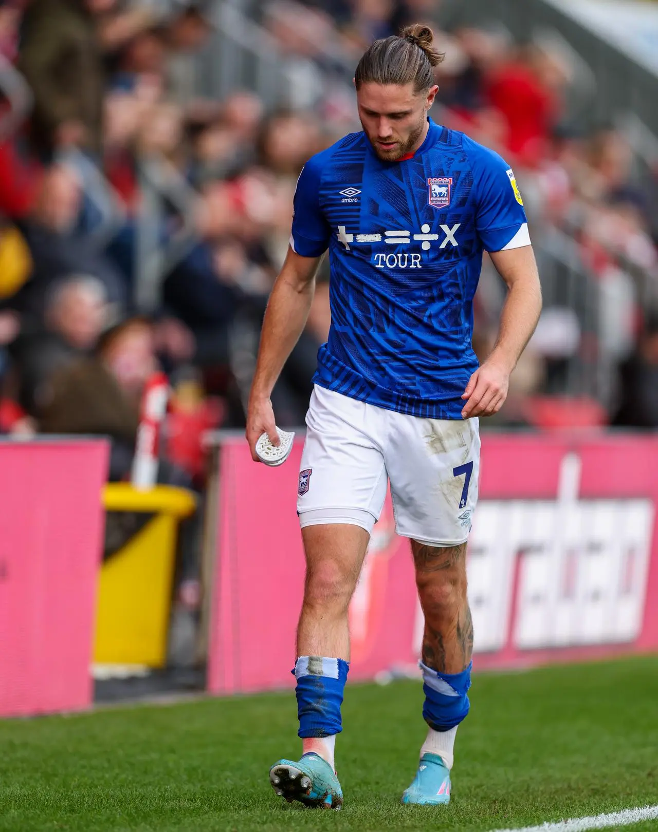 Ipswich's Wes Burns limps off against Exeter in League One in 2022