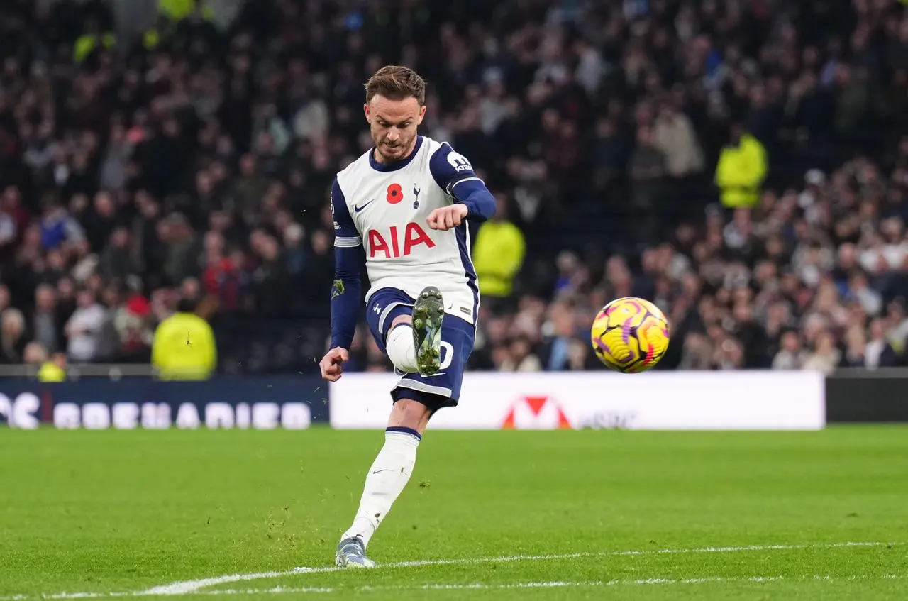 Tottenham Hotspur’s James Maddison scores from a free-kick