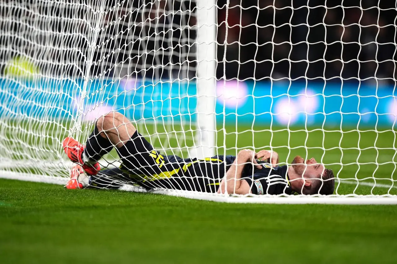 Anthony Ralston lying in the net against Croatia